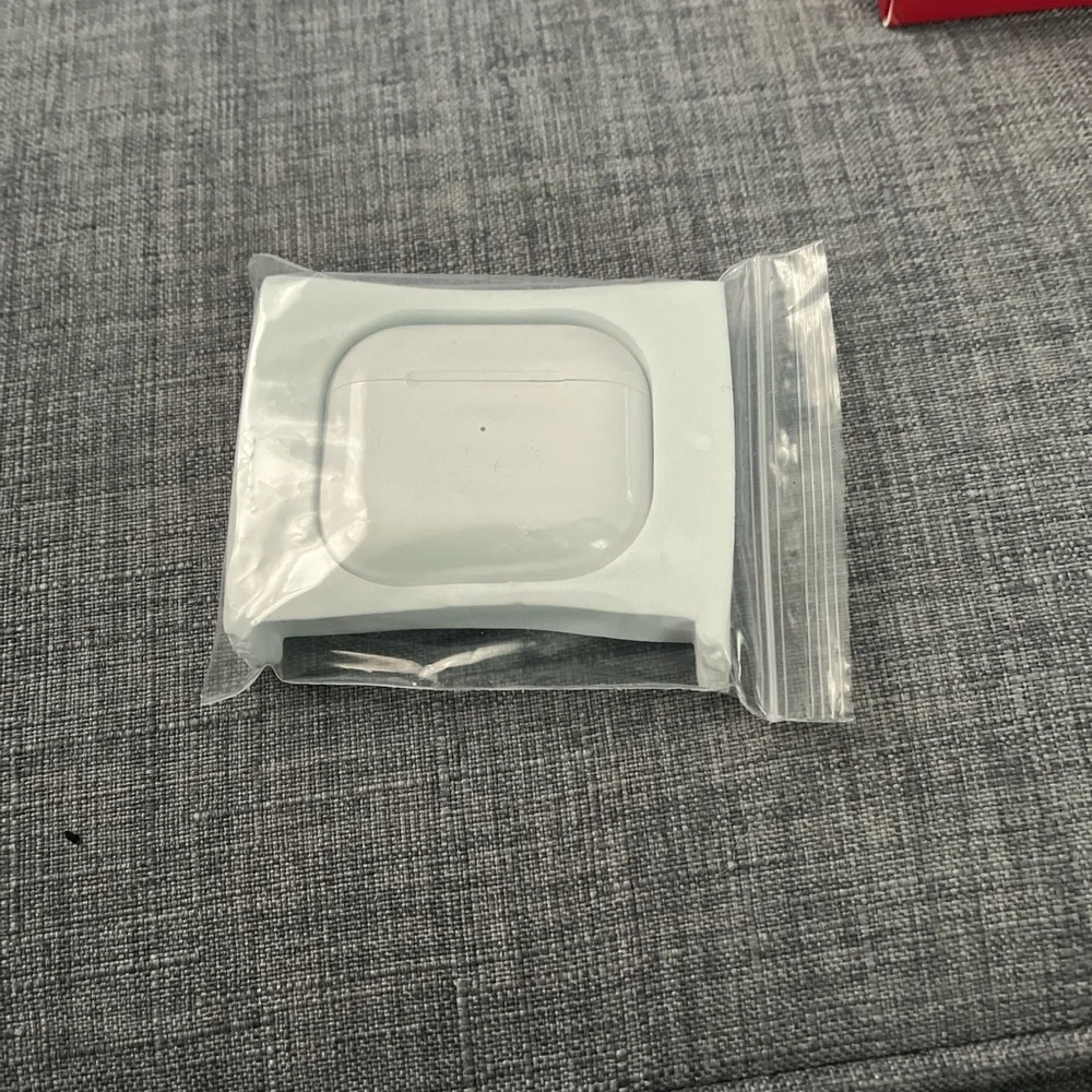 Apple White AirPods Wireless Headset charger, not included